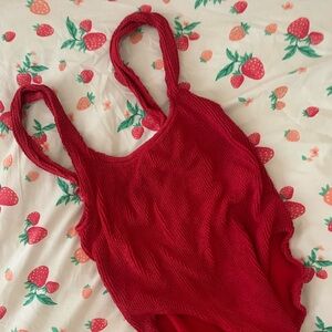 Red Youswim one piece bathing suit! One size fits most :)